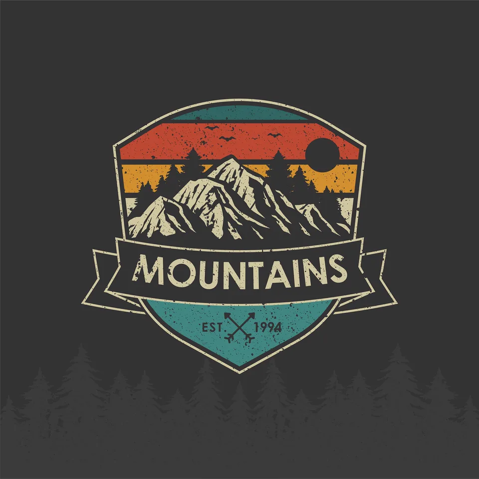 Retro mountain badge logo with the word MOUNTAINS on a dark background