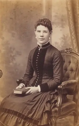Wan 3.0 clip: sepia cabinet card of a Victorian woman holding a book