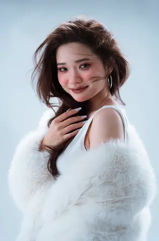 Grok Imagine 1.5 clip: studio portrait of a woman in a white fur wrap looking back over her shoulder
