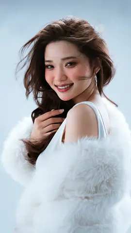 Veo 3.1 Fast clip: studio portrait of a woman in a white fur wrap looking back over her shoulder